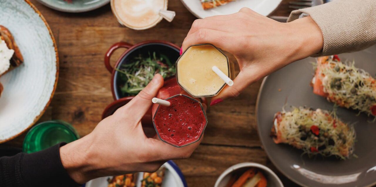 Drinks over a table of food